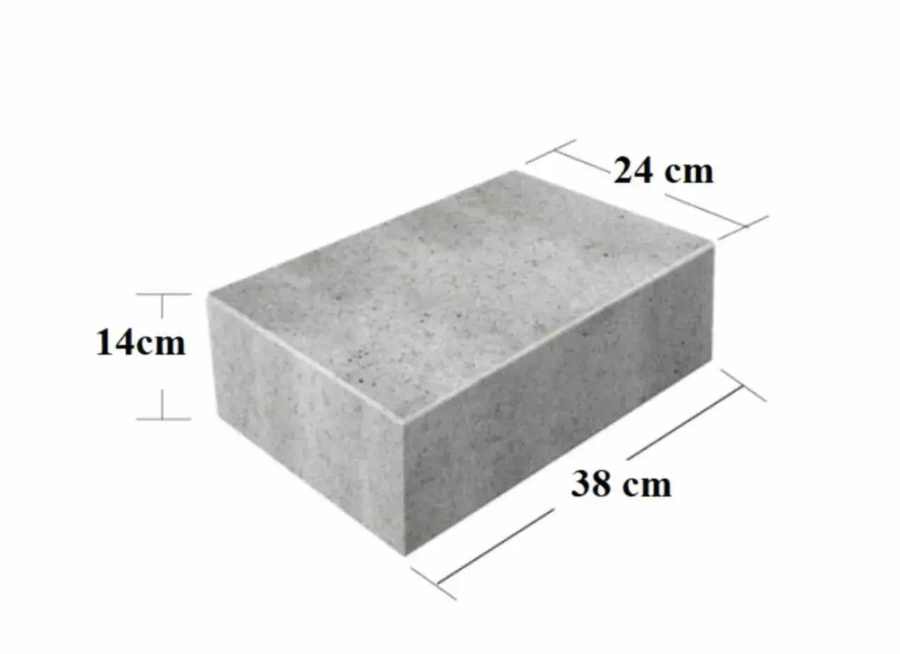 Szary bloczek betonowy z widocznymi wymiarami: 38 cm długości, 24 cm szerokości i 14 cm wysokości.