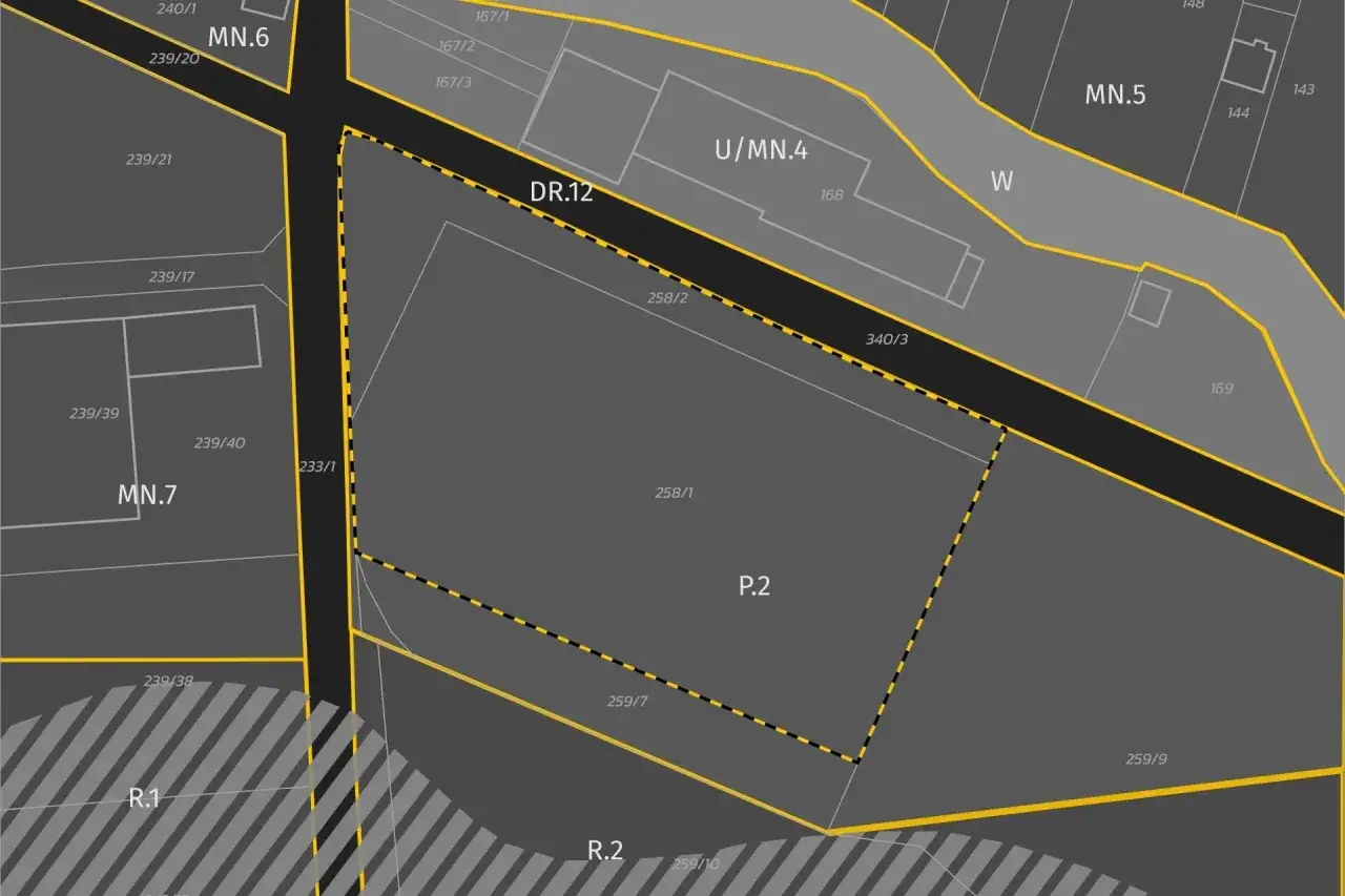 Mapa ewidencyjna z zaznaczonym terenem P.2. Widać podział na działki, ulice (DR.12) i strefy (MN.6, MN.7, MN.5, U/MN.4, R.1, R.2). Każdy metr kwadratowy jest precyzyjnie określony.